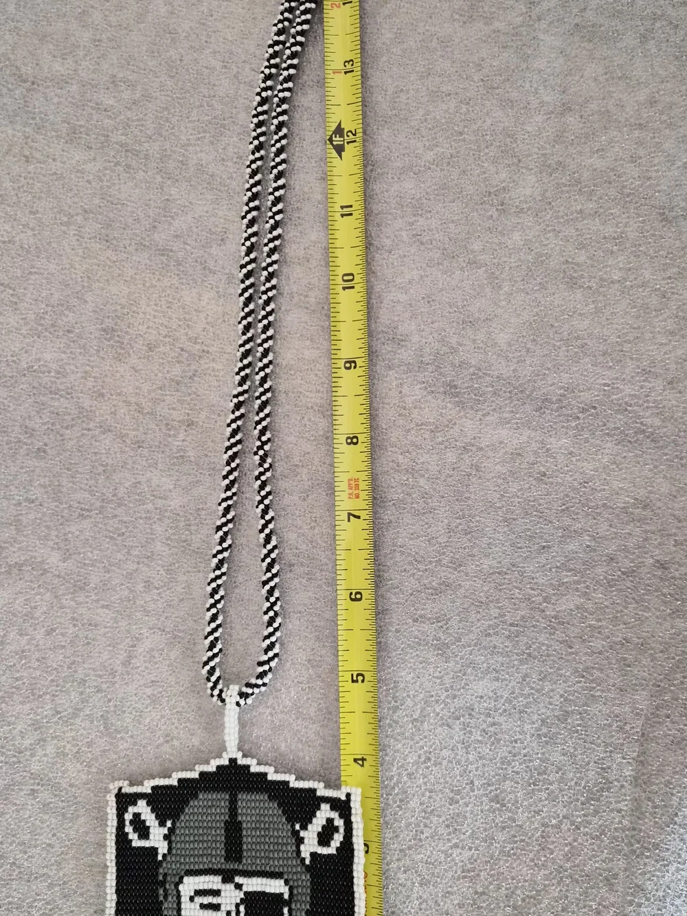 Hand Made Black and White Raiders Beaded Shield